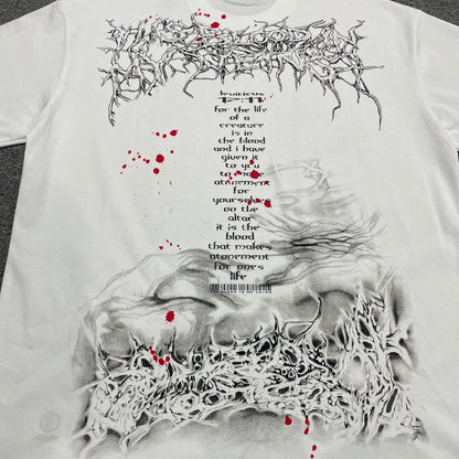 Full red and pink layered face graphic on Hellstar Red Face white T-shirt
Close-up of red face artwork and rhinestone embellishments on Hellstar white T-shirt
Close-up of crystal rhinestone details on Hellstar Red Face graphic T-shirt
Red paint splatter print detail on Hellstar Red Face white graphic T-shirt
Green Om symbol detail on Hellstar Red Face rhinestone graphic T-shirt