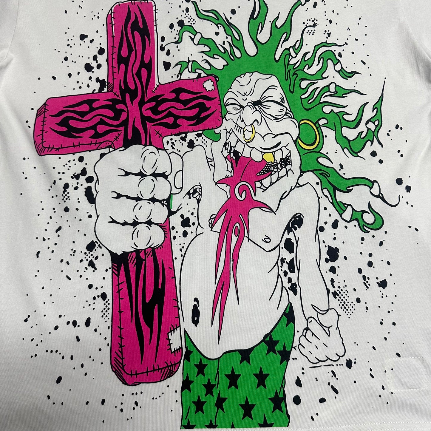 Close-up of the colorful front graphic on Hellstar Online white T-shirt
Detailed black outlines neon colors and paint splatter print on Hellstar Online graphic Tee
Neon pink flame cross graphic detail on Hellstar Online white T-shirt
Bright green flame graphic detail on Hellstar Online white streetwear T-shirt
Black paint splatter print detail on Hellstar Online white graphic T-shirt