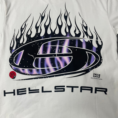 Full oval H logo and blue-purple flame graphic on Hellstar white T-shirt
Close-up of the oval H logo and blue flame print on Hellstar white T-shirt
Detailed black outlines and blue-purple flame artwork on Hellstar H Blue Flame Tee
Blue and purple flame print detail on Hellstar H Blue Flame white T-shirt
Oval H logo graphic detail on Hellstar H Blue Flame T-shirt
Red Om symbol graphic detail on Hellstar H Blue Flame white T-shirt