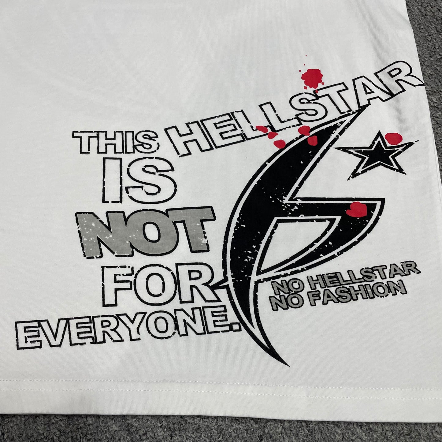 Full rear graphic print on Hellstar H Star white T-shirt
Close-up of the back graphic on Hellstar H Star white T-shirt