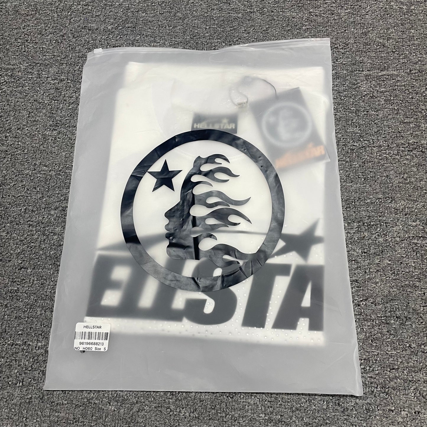 Hellstar Sports Core Rhinestone T-shirt inside individual zip packaging
Close-up of the individual packaging bag for Hellstar Sports Core T-shirt
Wholesale-ready Hellstar Sports Core T-shirt with labels hangtag and packaging
