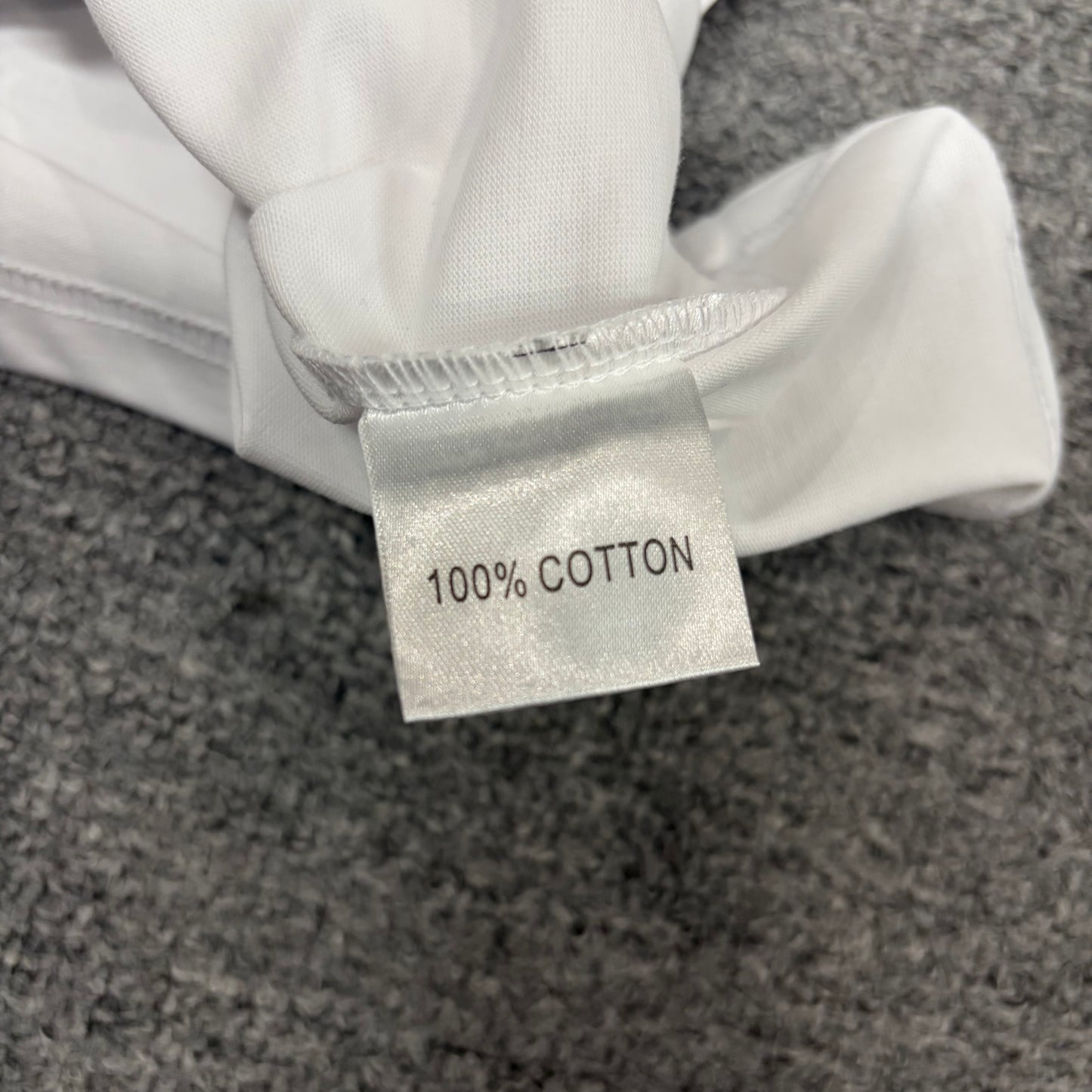 Hellstar wash care label inside Evil Eye graphic T-shirt