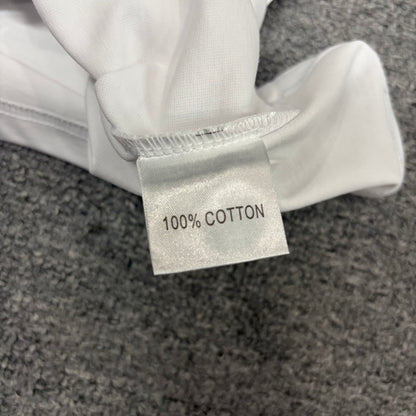 Hellstar wash care label inside Evil Eye graphic T-shirt