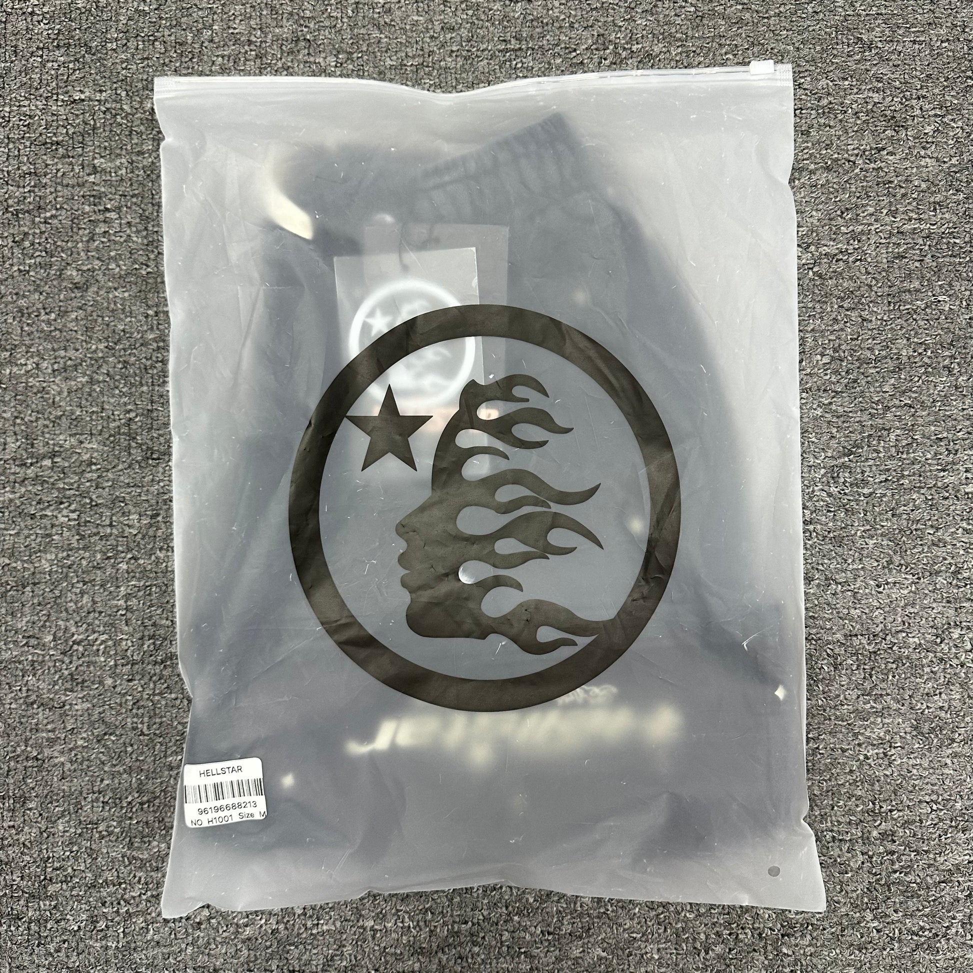 Hellstar Path to Paradise washed black shorts inside branded zip packaging
Hellstar Path to Paradise washed black graphic shorts product video preview