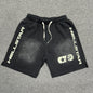 Hellstar Vertical Logo Flame Face washed black shorts front view