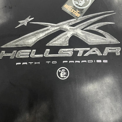 Full metallic silver Hellstar logo graphic on washed black T-shirt
Detailed metallic silver graphic print on Hellstar Chrome Logo T-shirt
Close-up of the metallic silver Hellstar logo surface
Metallic chrome-effect print texture on Hellstar black graphic T-shirt
Path to Paradise lettering detail below the Hellstar chrome logo
Hellstar shooting-star logo detail on Chrome Logo black T-shirt
Distressed black and grey wash effect across Hellstar Chrome Logo T-shirt