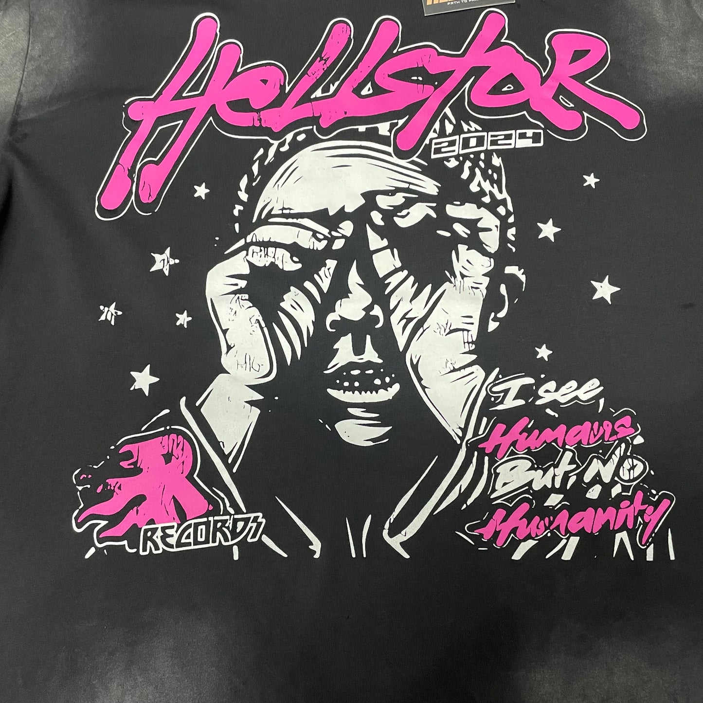Detailed pink white and black artwork on Hellstar No Humanity graphic T-shirt
Large pink Hellstar logo lettering on washed black graphic T-shirt
Distressed face graphic with hands covering the eyes on Hellstar black T-shirt
Hands covering eyes graphic detail on Hellstar No Humanity T-shirt
I See Humans But No Humanity lettering on Hellstar washed black T-shirt