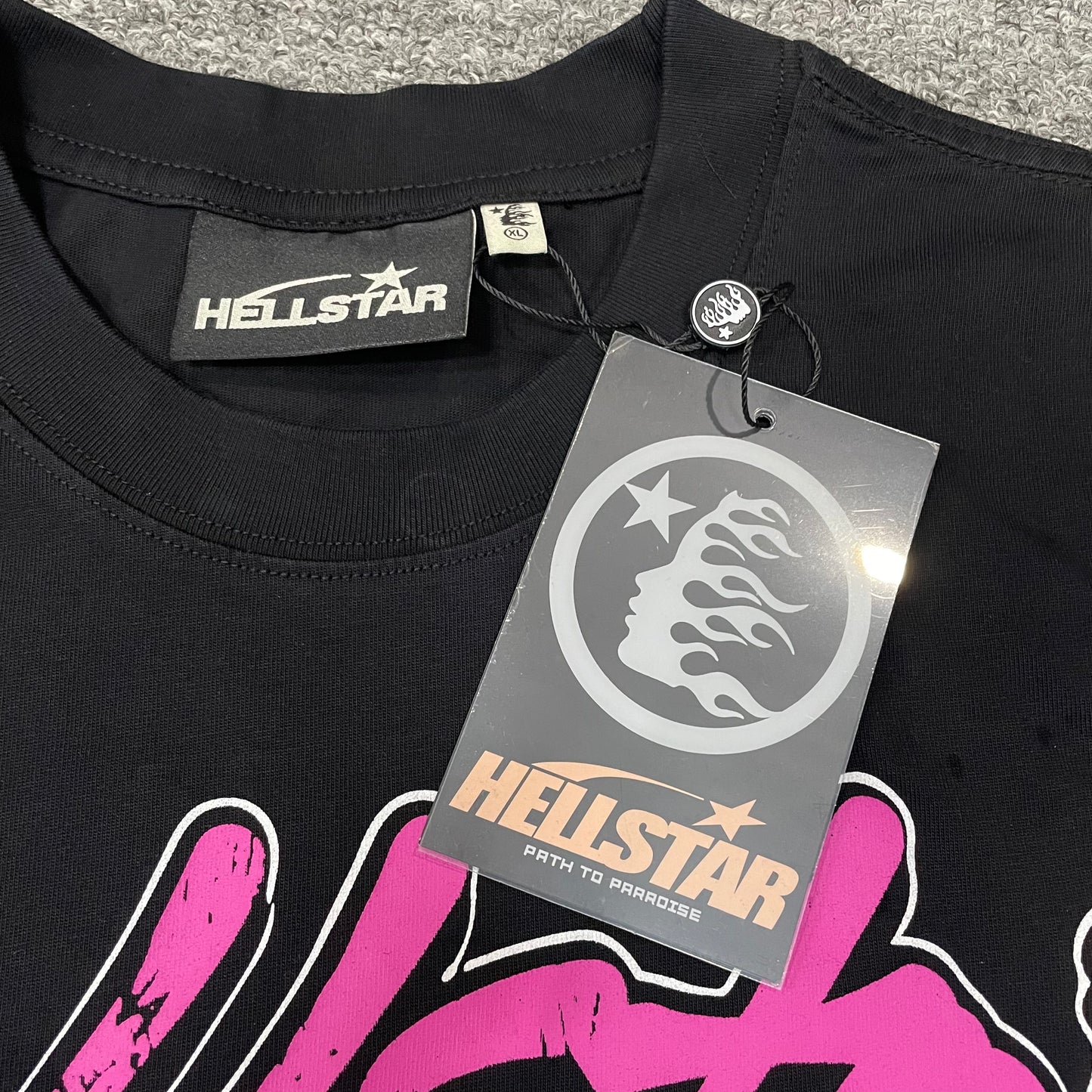 Crew neck collar and stitching detail on Hellstar No Humanity T-shirt
Hellstar woven neck label inside No Humanity washed black T-shirt
Hellstar size label detail inside No Humanity washed black T-shirt
Hellstar branded hangtag attached to No Humanity washed black T-shirt