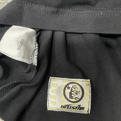 Hellstar wash care label inside Classic Logo black T-shirt
NFC tag detail attached to Hellstar Classic washed black T-shirt