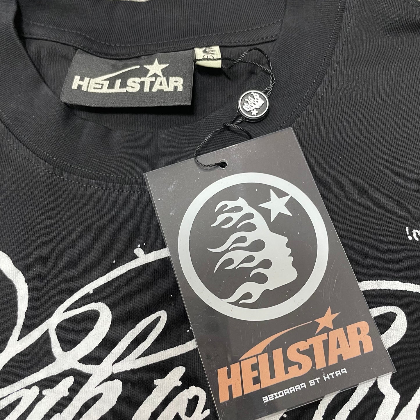 Crew neck collar and stitching detail on Hellstar Path to Paradise T-shirt
Hellstar woven neck label inside Path to Paradise washed black T-shirt
Hellstar size label detail inside Path to Paradise washed black T-shirt
Hellstar branded hangtag attached to Path to Paradise black T-shirt