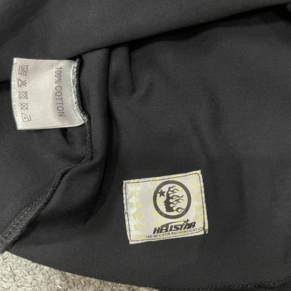 Hellstar wash care label inside I Love NY graphic T-shirt
NFC tag detail attached to Hellstar I Love NY washed black T-shirt
