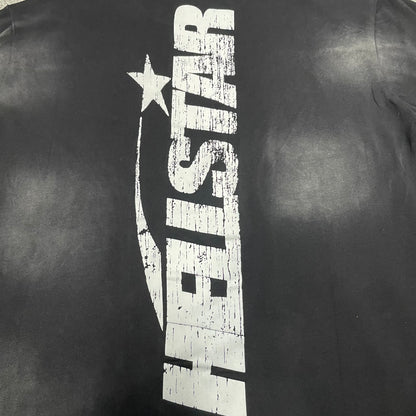Full oversized Hellstar Flame Face and star graphic on washed black T-shirt
Close-up of white Hellstar Flame Face graphic on black T-shirt
Detailed view of distressed Hellstar Flame Face print texture
Close-up of white star graphic beside the Hellstar Flame Face design