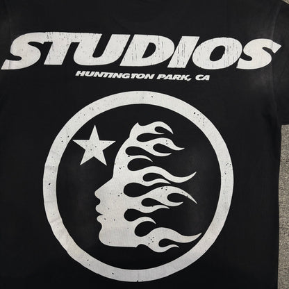 Oversized Studios Huntington Park flame-face graphic on black T-shirt