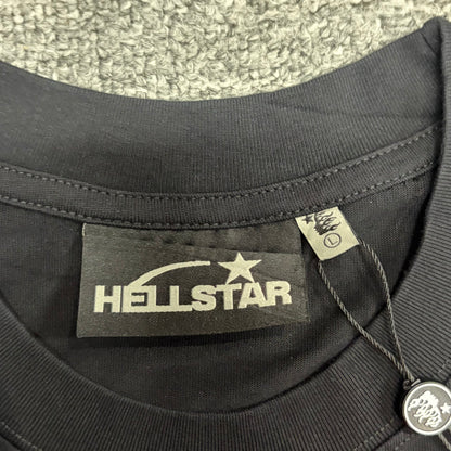 Close-up of ribbed crew neck and neckline of ribbed crew neck and neckline stitching on Hellstar T-shirt
Hellstar neck label inside Studios Cartoon Glitter Logo T-shirt
Size label inside Hellstar Studios washed black T-shirt
Hellstar branded hang tag attached to washed black graphic T-shirt