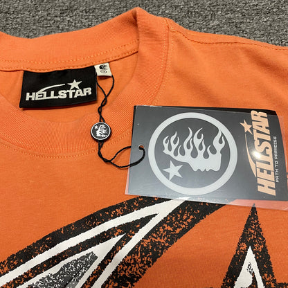 Close-up of ribbed crew neck and neckline stitching on Hellstar T-shirt
Hellstar branded neck label inside H Sharp orange T-shirt
Size label inside Hellstar H Sharp graphic T-shirt
Hellstar branded hang tag attached to H Sharp orange T-shirt