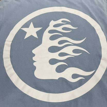 Full back graphic detail on Hellstar Sports Core blue T-shirt
Detailed view of rhinestone placement and Sports Core logo construction
Vintage acid-wash texture on Hellstar light blue T-shirt