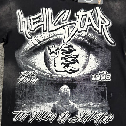 Full front Hellstar Eyeball Brainwashed graphic on washed black T-shirt
Monochrome Hellstar artwork featuring an oversized eye flame-face icon and futuristic text
Close-up of oversized eyeball graphic on Hellstar washed black T-shirt
Close-up of Hellstar flame-face icon inside the eyeball graphic