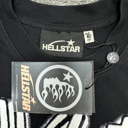 Close-up of ribbed crew neck and neckline stitching on Hellstar Eyeball T-shirt
Hellstar branded neck label inside Eyeball graphic black T-shirt
Size label inside Hellstar Eyeball washed black T-shirt
Hellstar branded hang tag attached to Eyeball graphic T-shirt