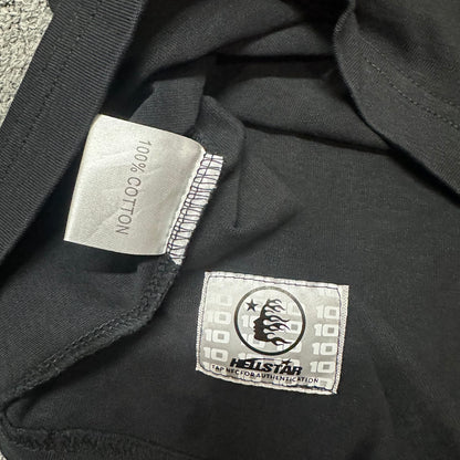 Close-up of bottom hem stitching on Hellstar Path To Paradise T-shirt
Fabric composition and care label inside Hellstar Path To Paradise T-shirt
NFC tag detail on Hellstar Path To Paradise washed black T-shirt