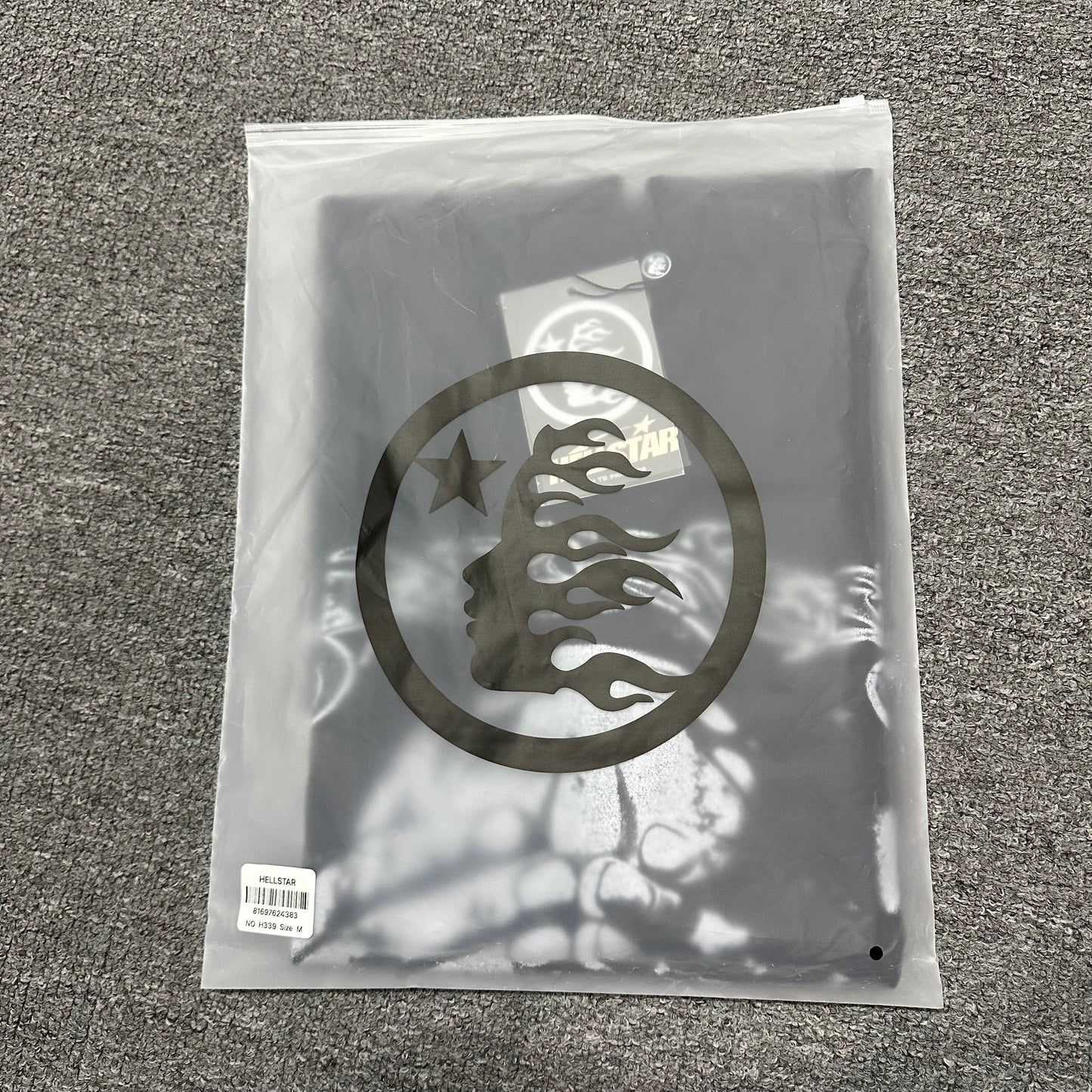Hellstar No Evil washed black T-shirt inside branded zip packaging
Hellstar No Evil washed black graphic T-shirt product video preview