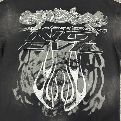 Oversized No Evil lettering and flame graphic on the back of Hellstar T-shirt
Hellstar Hear It Speak and No Evil typography with flame artwork
Close-up of No Evil back lettering and distressed graphic details
Close-up of distressed flame graphics on the back of Hellstar T-shirt
Vintage washed black finish and faded areas on Hellstar No Evil T-shirt