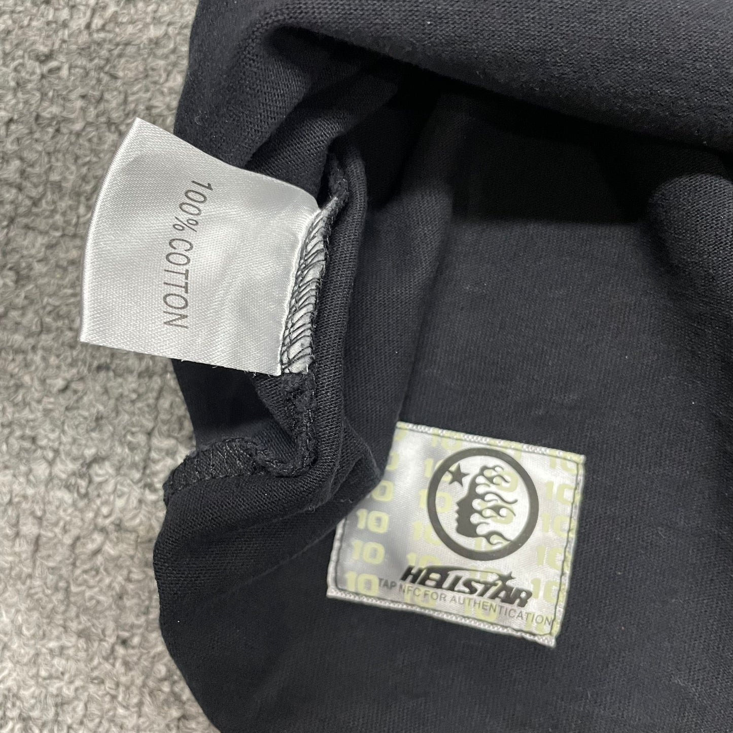 Hellstar 2 Lambs Holy State sleeveless tee straight hem stitching detail
Hellstar 2 Lambs Holy State sleeveless T-shirt wash care label detail
Hellstar 2 Lambs Holy State sleeveless T-shirt NFC tag detail