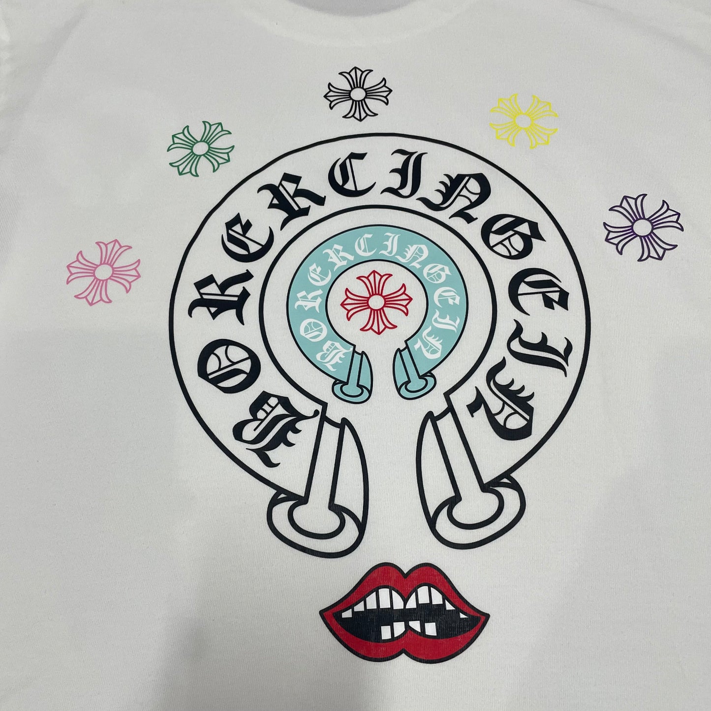 Detailed streetwear graphic printing quality on horseshoe cross t-shirt