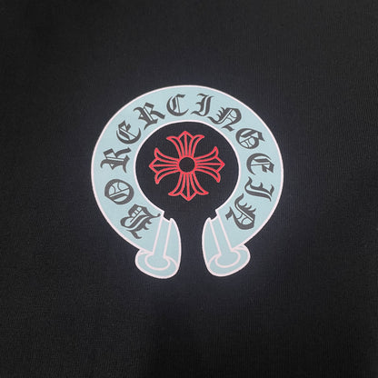 Chrome Hearts horseshoe cross chest logo print close up detail