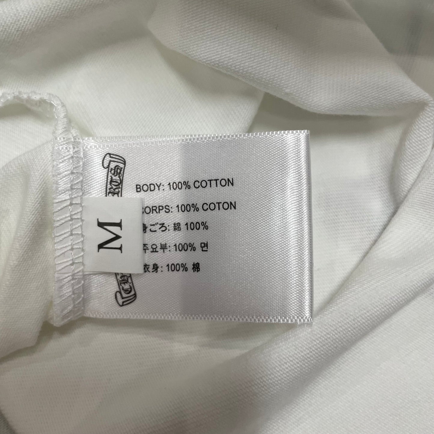 Chrome Hearts style t-shirt size label wash label and hem stitching detail
