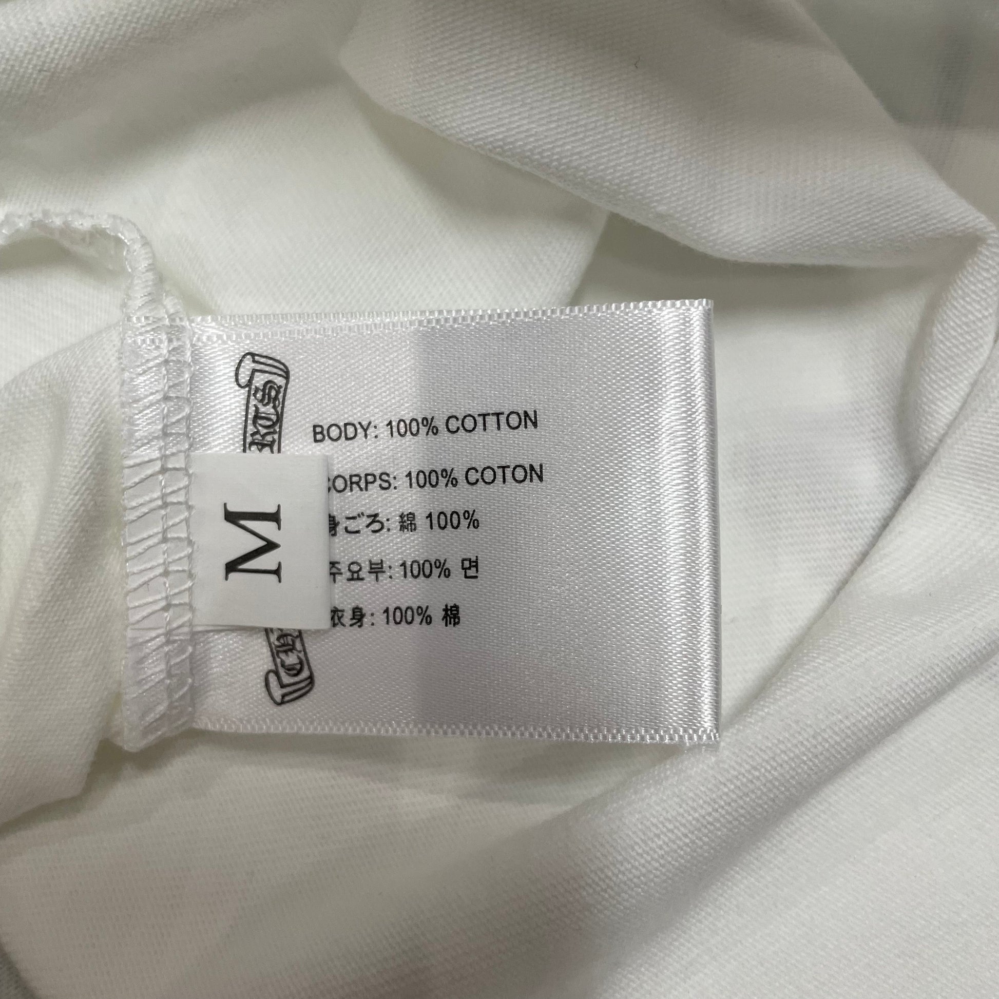 Chrome Hearts style t-shirt size label wash label and hem stitching detail