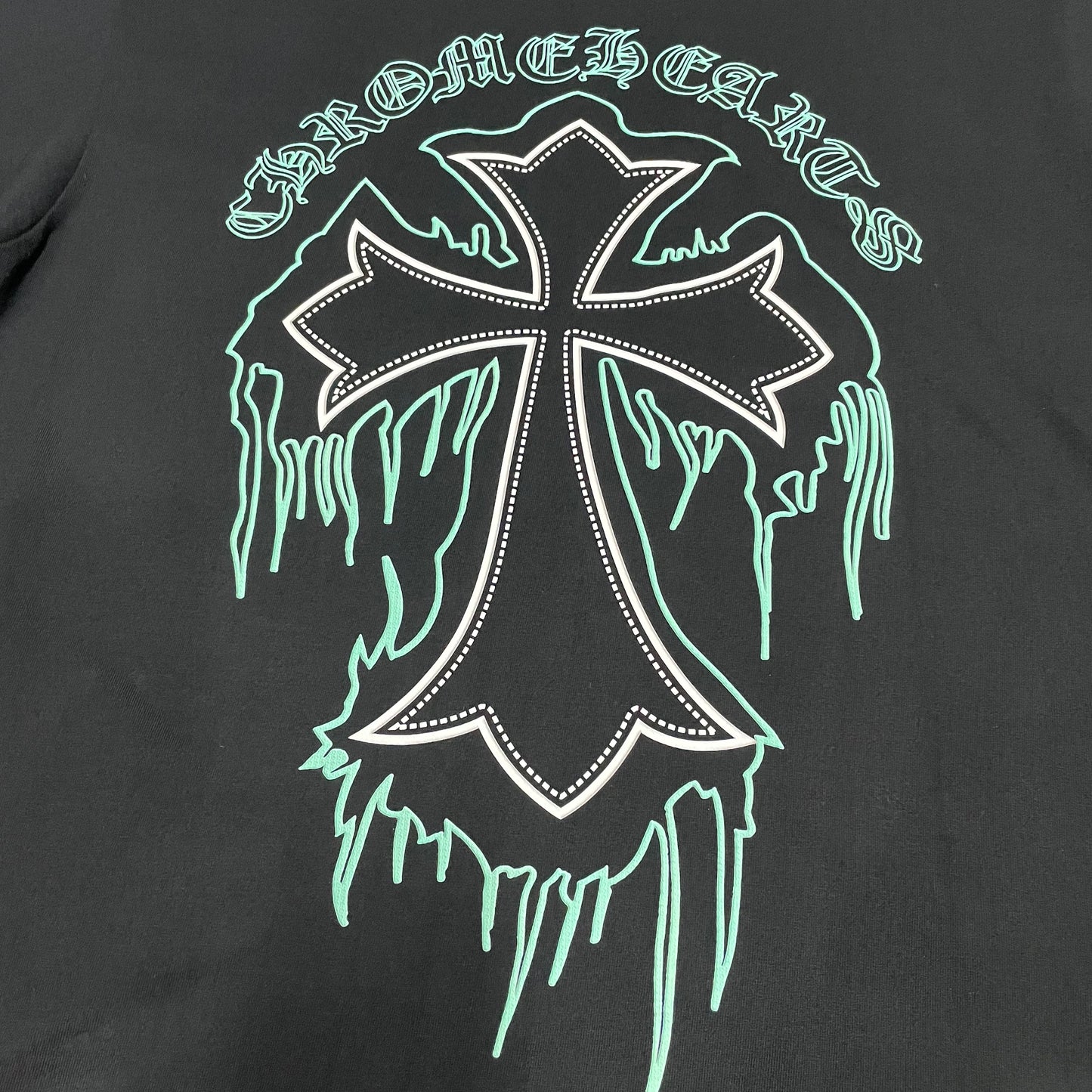 Chrome Hearts dripping cross back graphic print close up detail
Detailed streetwear graphic printing quality on dripping cross t-shirt