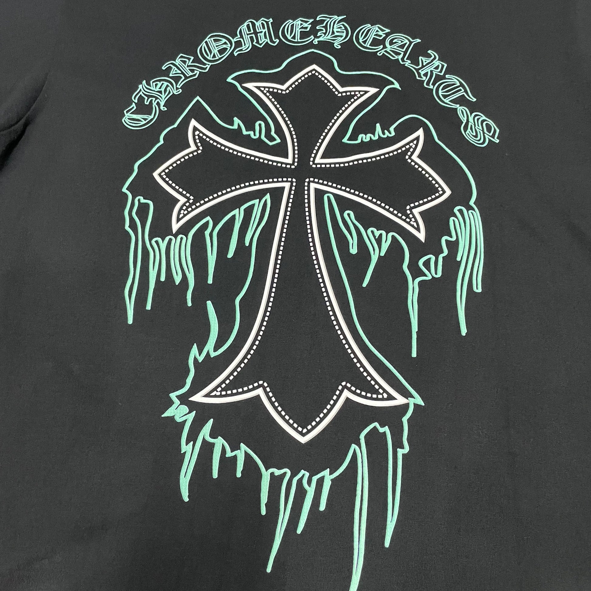 Chrome Hearts dripping cross back graphic print close up detail
Detailed streetwear graphic printing quality on dripping cross t-shirt