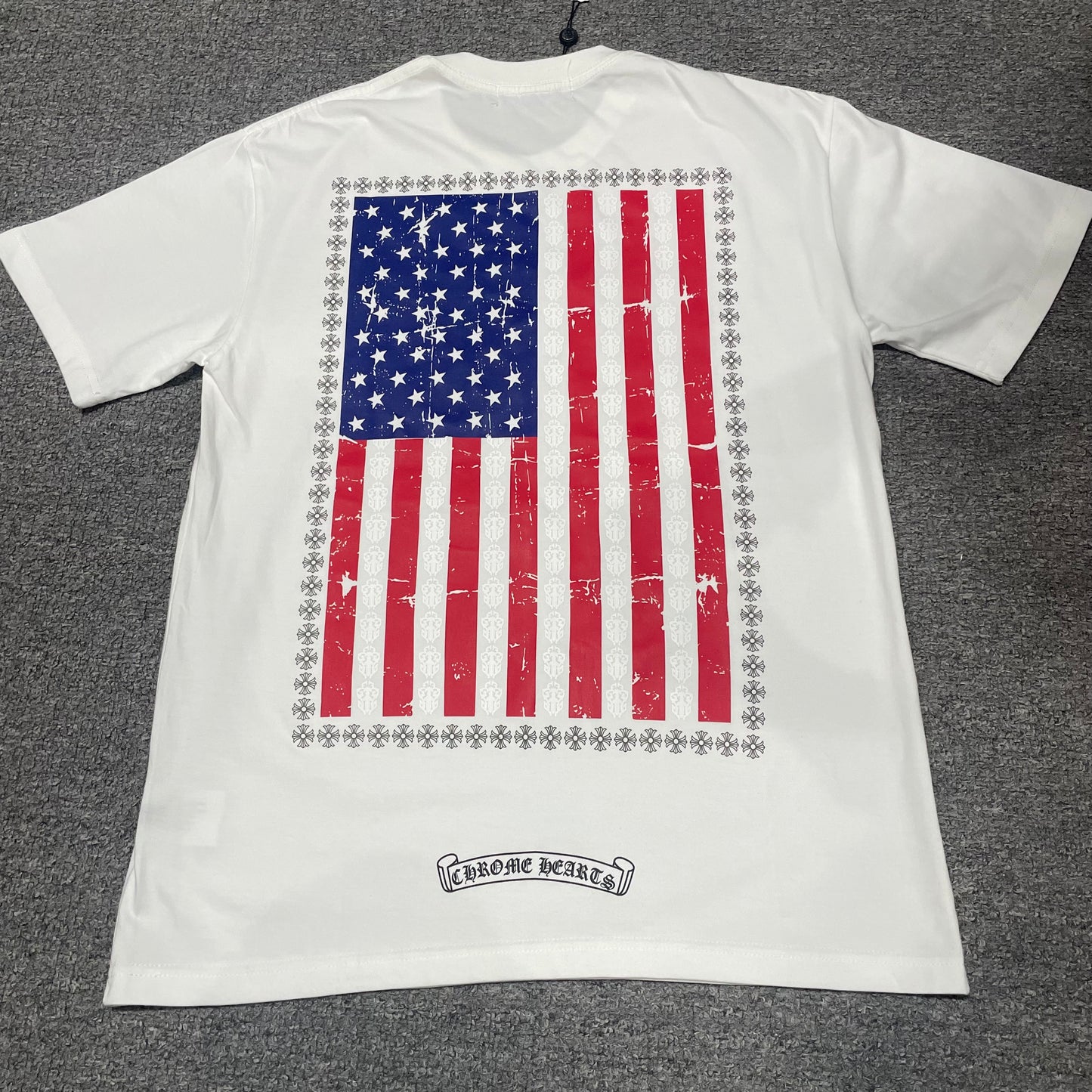 White Chrome Hearts American Flag Dagger T-shirt back view with distressed USA flag print