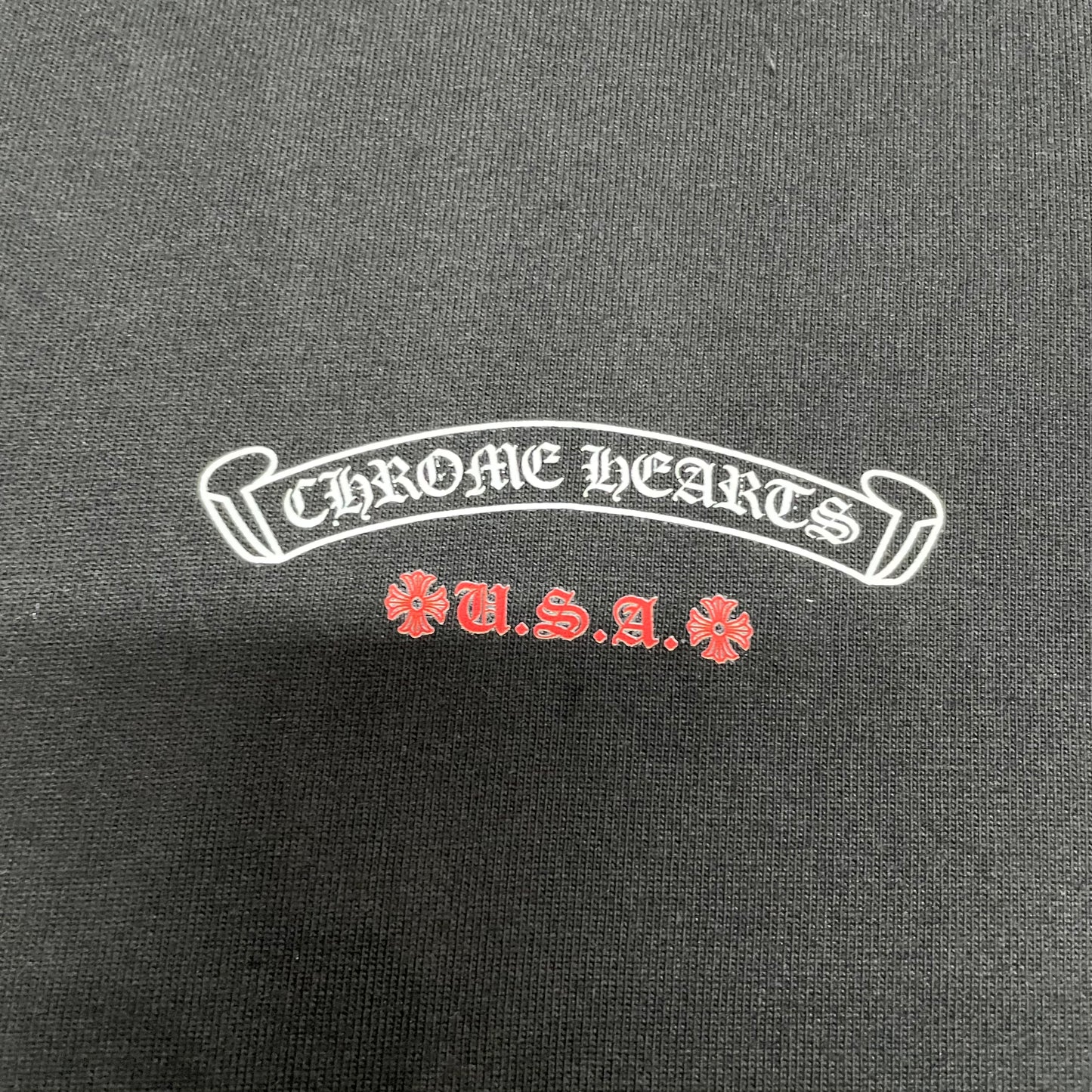 Small Chrome Hearts USA chest logo print detail on black American Flag T-shirt