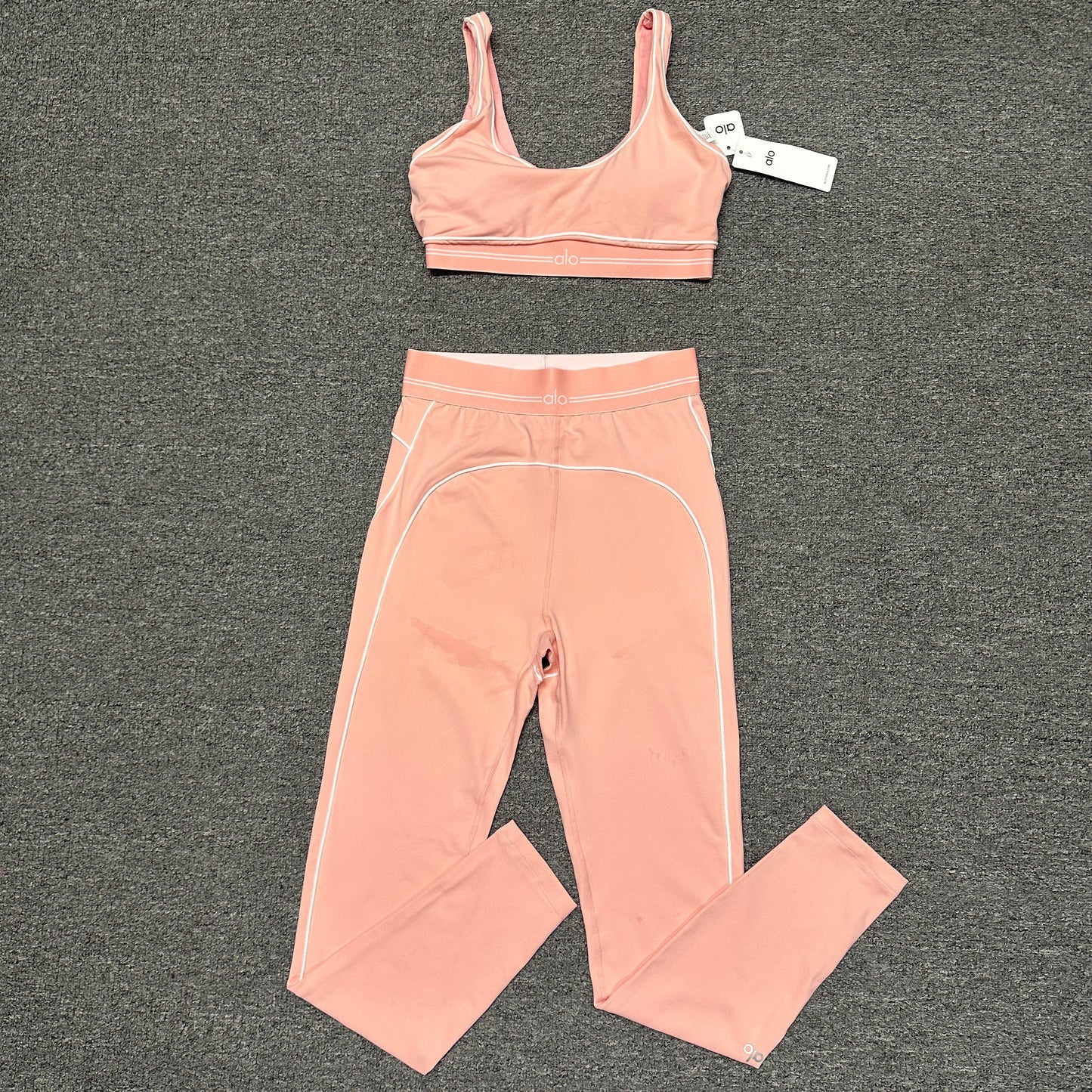 ALO Heart Throb Bra and High-Waist Legging Set in Candy Heart Pink White front view