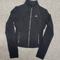ALO Airbrush Corset Full Zip Jacket in Black front view with sculpted contour seams