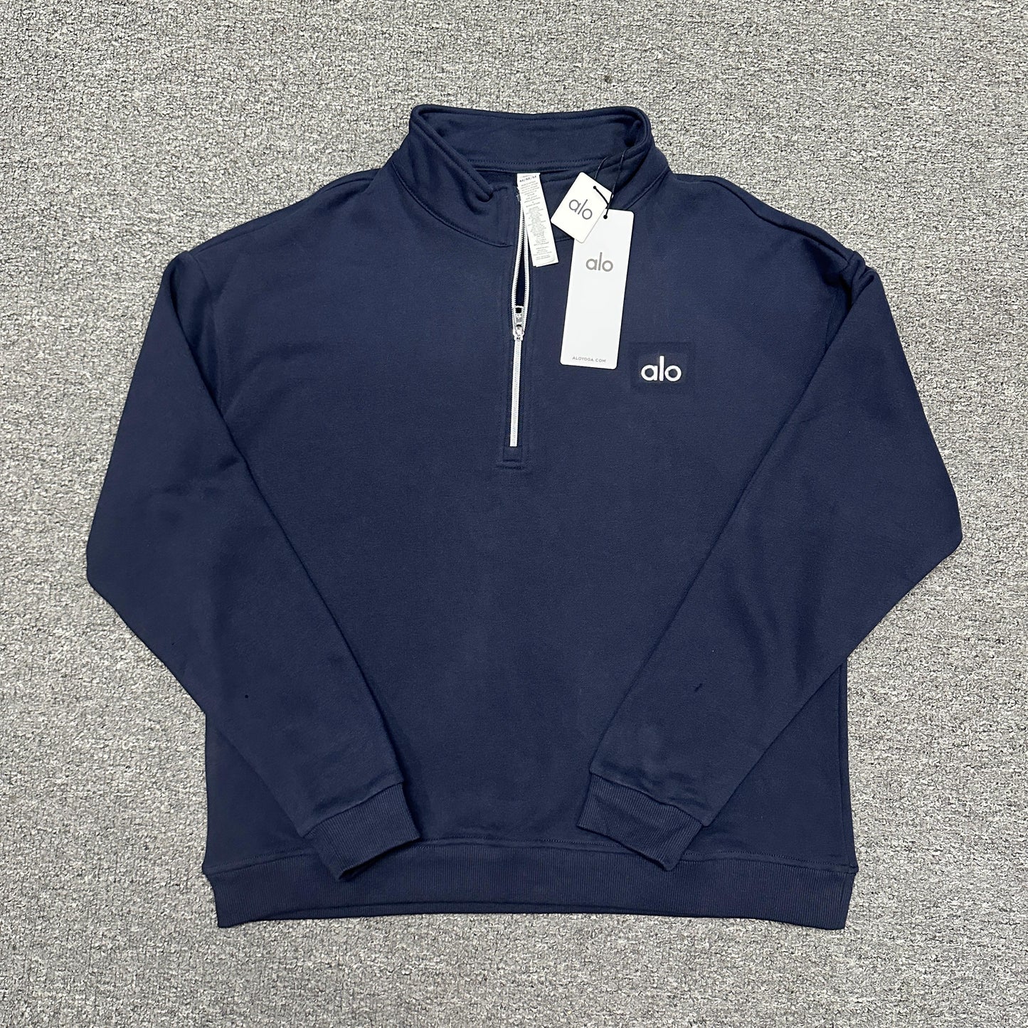 ALO Accolade 1/4 Zip Pullover in Navy front view with embroidered chest logo