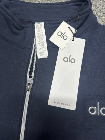 ALO Accolade Navy pullover stand collar and quarter zip construction detail
ALO Accolade Navy quarter zip pullover neck label and size tag detail
ALO Accolade Navy quarter zip pullover with branded retail hangtags
ALO Accolade Navy pullover care label and fabric information detail