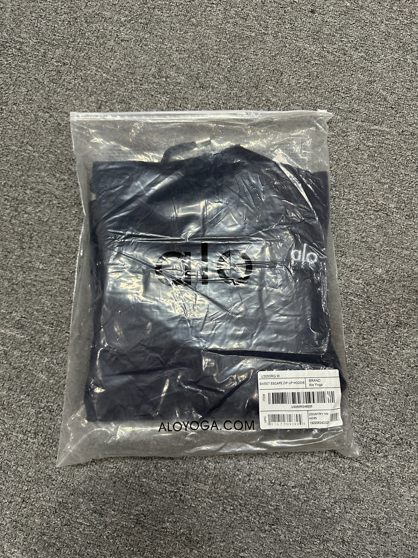 ALO Accolade Navy hoodie folded inside branded zip packaging bag
ALO Accolade Black hoodie folded inside branded zip packaging bag
ALO Accolade Athletic Heather Grey hoodie folded inside branded zip packaging bag
ALO Accolade Espresso hoodie folded inside branded zip packaging bag

