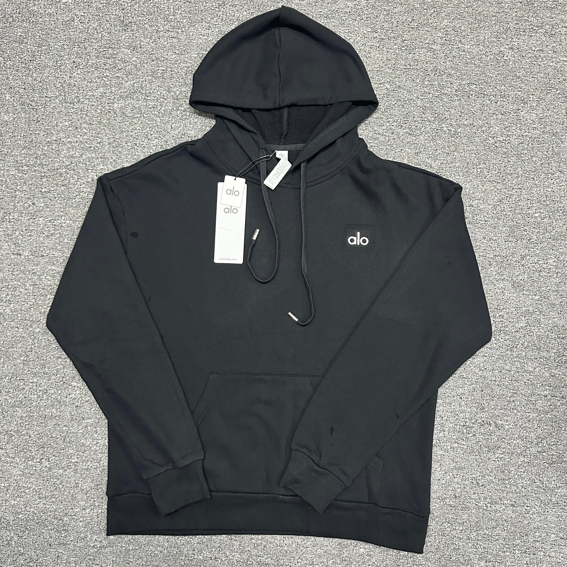 ALO Accolade Hoodie in Black front view with embroidered chest logo