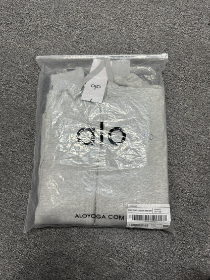 ALO Accolade Athletic Heather Grey hoodie folded inside branded zip packaging bag