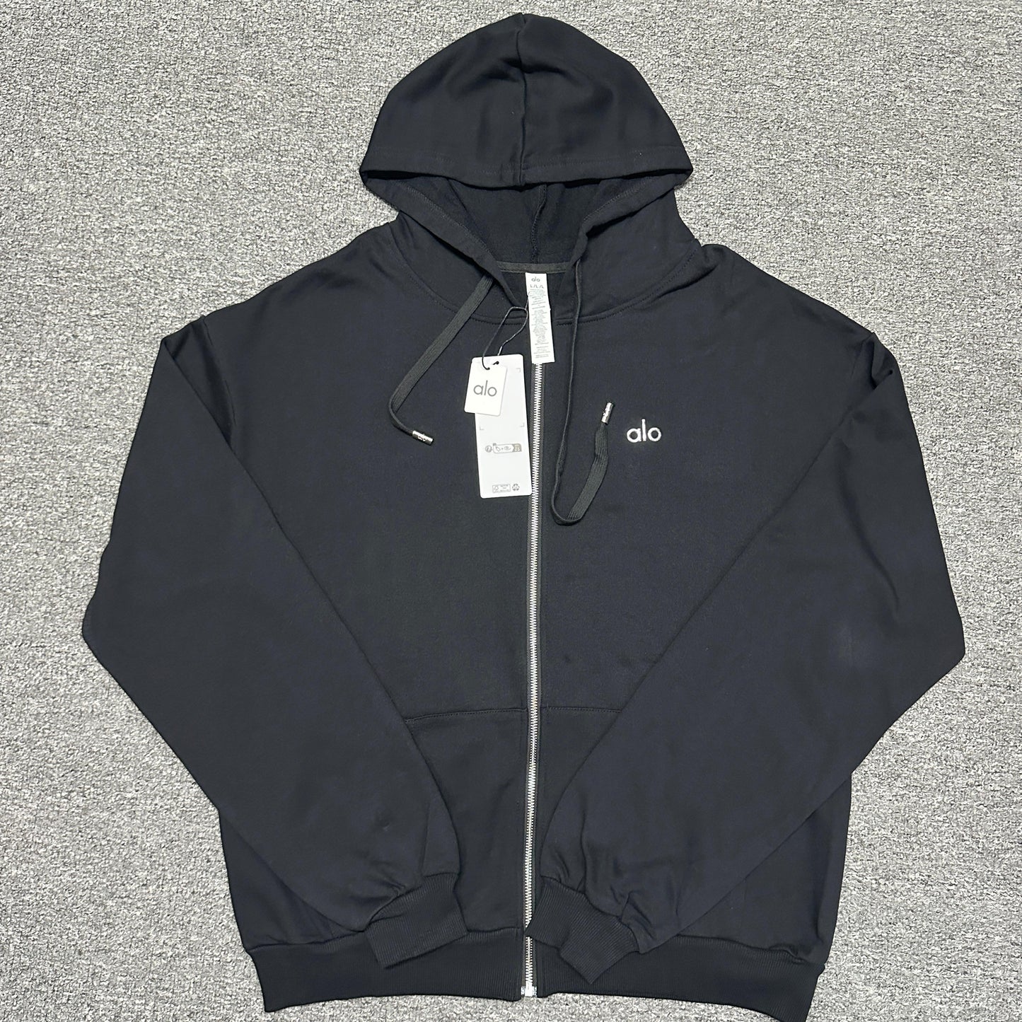 ALO Accolade Full Zip Hoodie in Black front view with embroidered chest logo