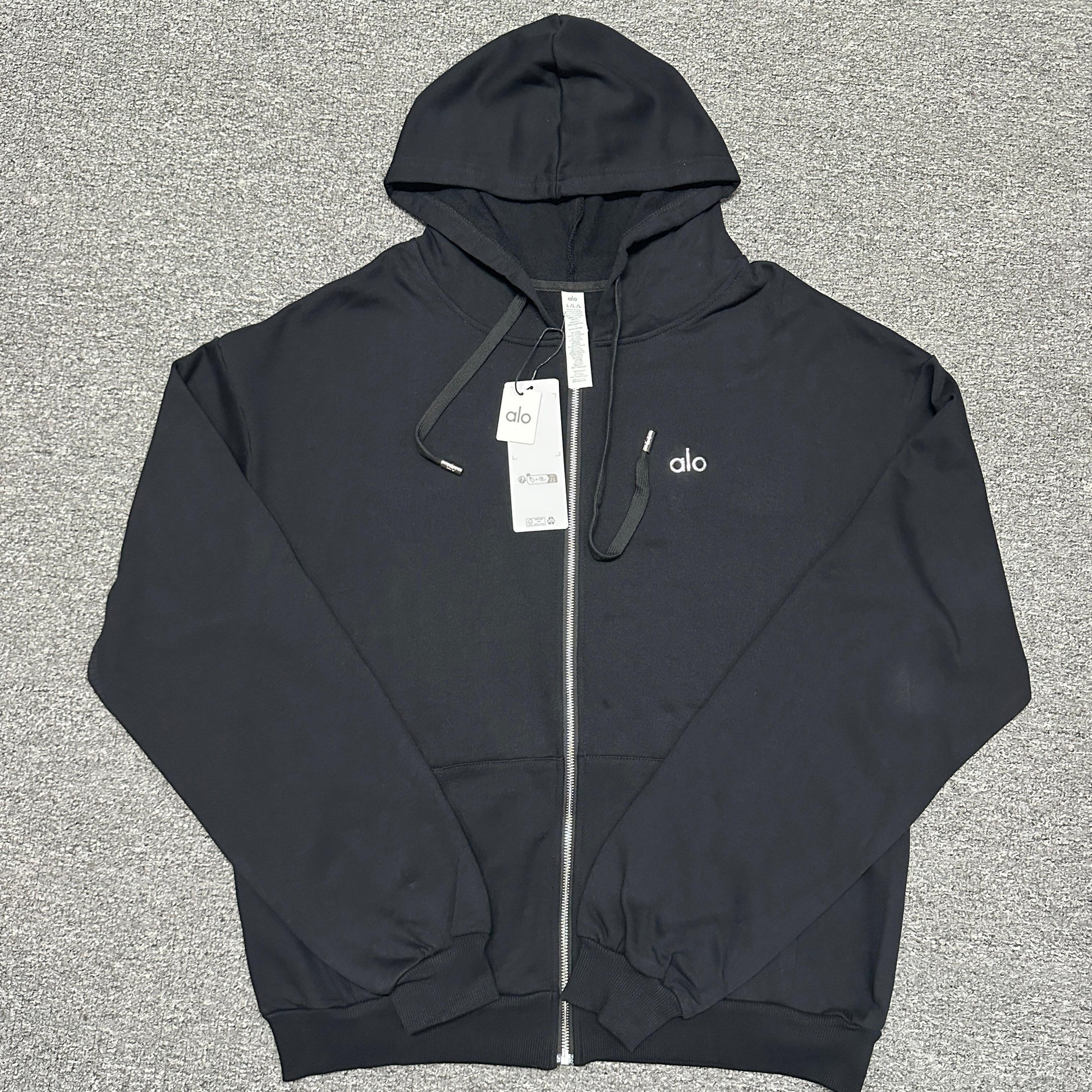 ALO Accolade Full Zip Hoodie in Black front view with embroidered chest logo
