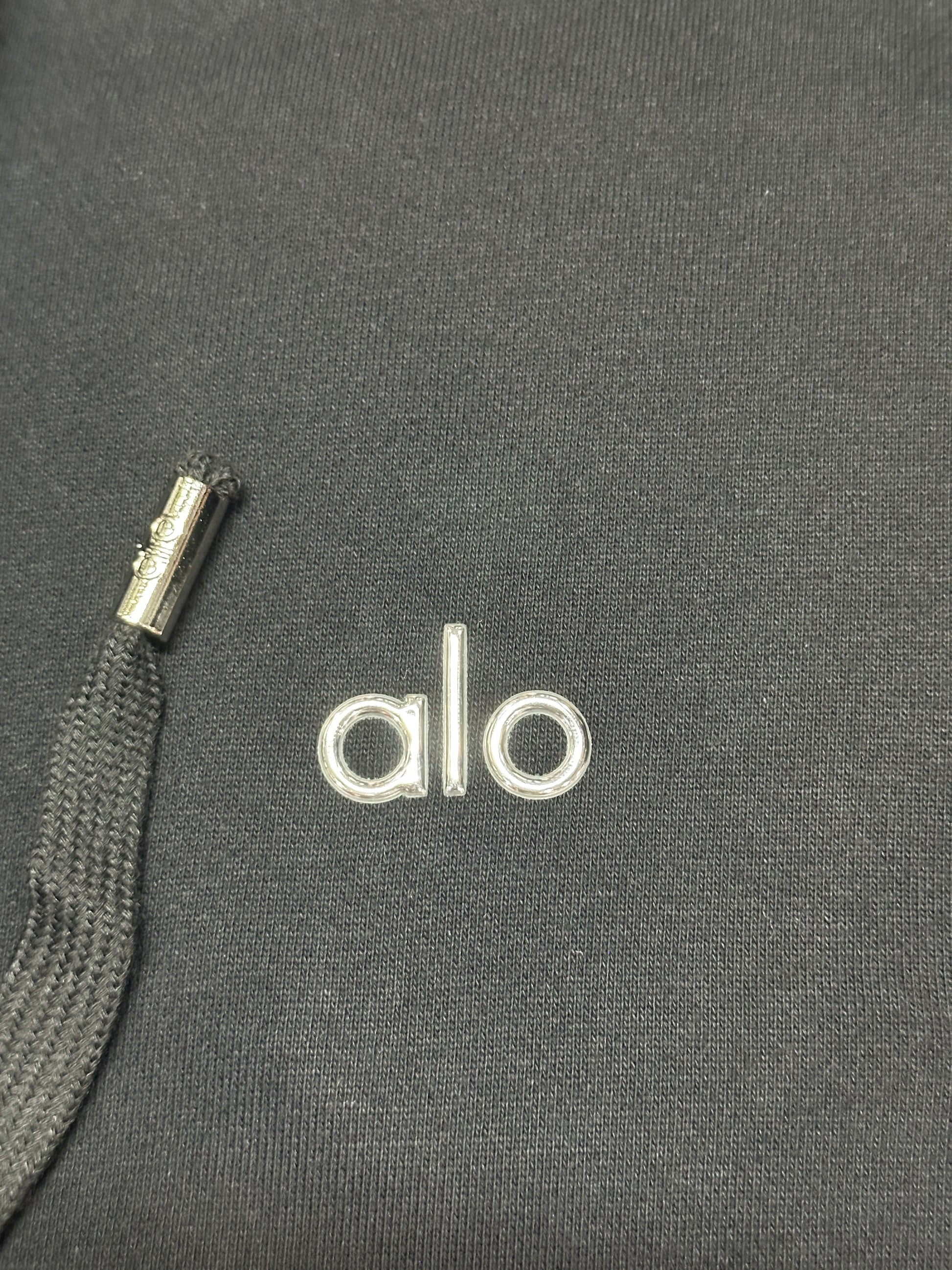 ALO embroidered chest logo placement on Black Accolade Full Zip Hoodie