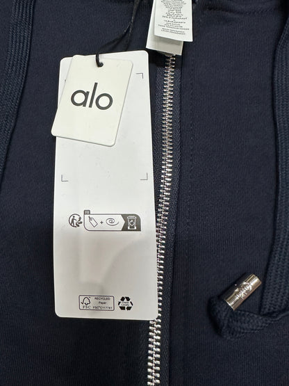 ALO Accolade Navy full zip hoodie neckline, hood and drawstring construction detail
ALO Accolade Navy full zip hoodie neck label close-up
ALO Accolade Navy full zip hoodie size label detail
ALO Accolade Navy full zip hoodie with branded retail hangtags
