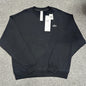 ALO Accolade Crew Neck Pullover in Black front view with silver chest logo
