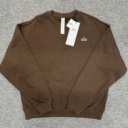 ALO Accolade Crew Neck Pullover in Espresso front view with silver chest logo