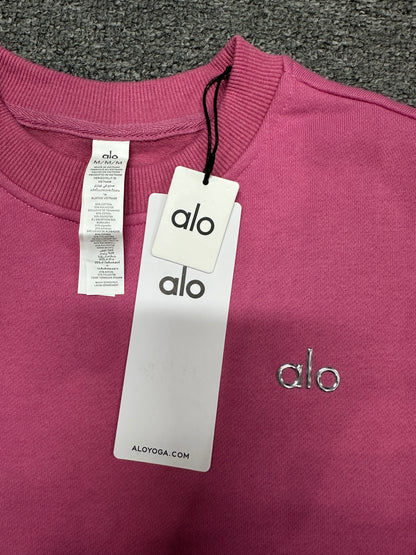 ALO Accolade Paradise Pink pullover ribbed crew neckline and stitching detail
ALO Accolade Paradise Pink crewneck neck label and size information detail
ALO Accolade Paradise Pink crewneck sweatshirt with branded retail hangtags
ALO Accolade Paradise Pink pullover care label and fabric information detail
