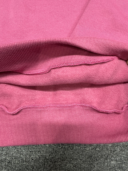 Soft fleecy French terry interior close-up of Paradise Pink ALO Accolade pullover