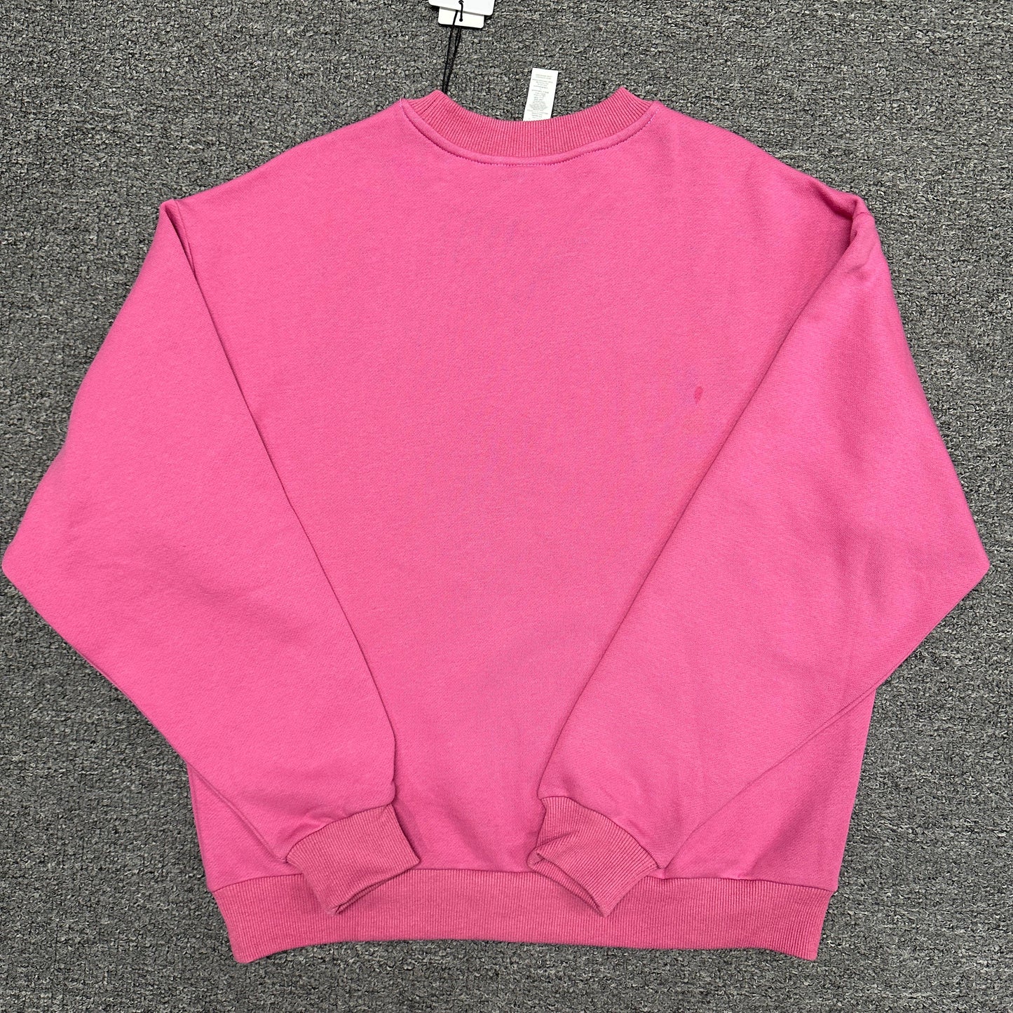 ALO Accolade Crew Neck Pullover in Paradise Pink back view showing the relaxed fit